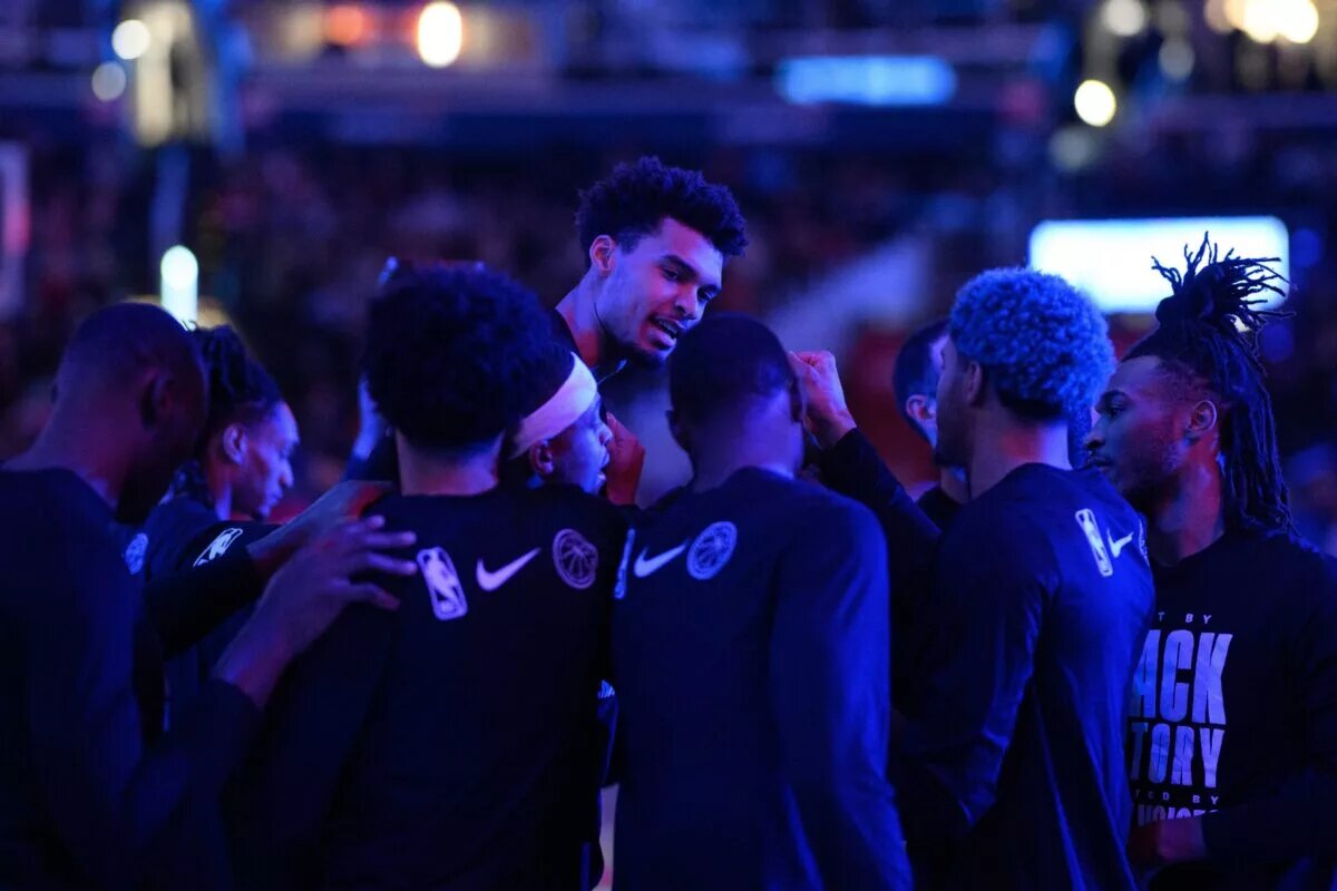 Feb 10, 2025; Washington, District of Columbia, USA; San Antonio Spurs center Victor Wembanyama (1) in a huddle before the game between the Washington Wizards and the San Antonio Spurs at Capital One Arena. Mandatory Credit: Reggie Hildred-Imagn Images