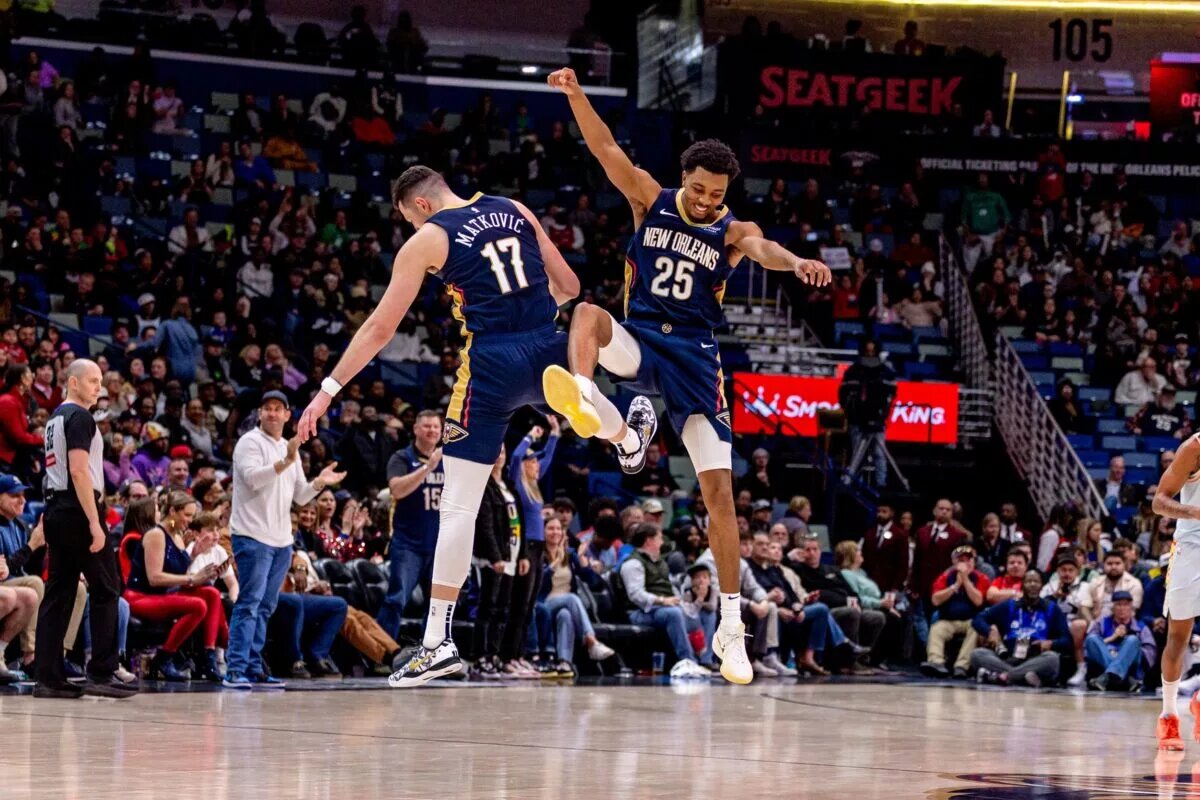 New Orleans Pelicans guard Trey Murphy III (25) celebrates making a three point basket with center Karlo Matkovic