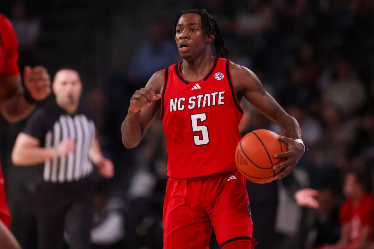 Mar 1, 2025; Atlanta, Georgia, USA; North Carolina State Wolfpack guard Trey Parker (5) handles the ball against the Georgia Tech Yellow Jackets in the first half at McCamish Pavilion. Mandatory Credit: Brett Davis-Imagn Images