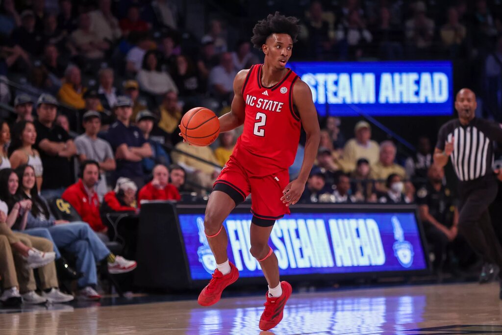 Mar 1, 2025; Atlanta, Georgia, USA; North Carolina State Wolfpack guard Paul McNeil (2) dribbles against the Georgia Tech Yellow Jackets in the first half at McCamish Pavilion. Mandatory Credit: Brett Davis-Imagn Images