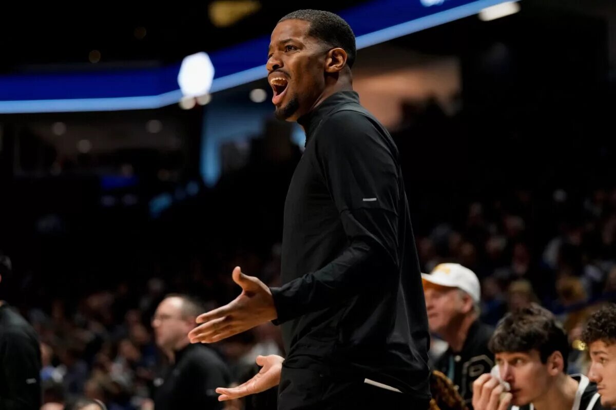 Providence Friars head coach Kim English shouts to his defense in the first half of the NCAA Big East men’s basketball game between the Xavier Musketeers and the Providence Friars at the Cintas Center in Cincinnati on Saturday, March 8, 2025.