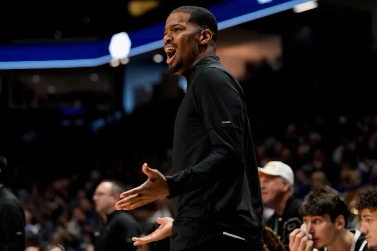 Providence Friars head coach Kim English shouts to his defense in the first half of the NCAA Big East men’s basketball game between the Xavier Musketeers and the Providence Friars at the Cintas Center in Cincinnati on Saturday, March 8, 2025.