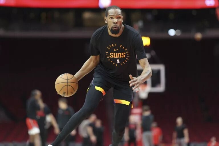 Mar 12, 2025; Houston, Texas, USA; Phoenix Suns forward Kevin Durant (35) warms up before the game against the Houston Rockets at Toyota Center. Mandatory Credit: Troy Taormina-Imagn Images
