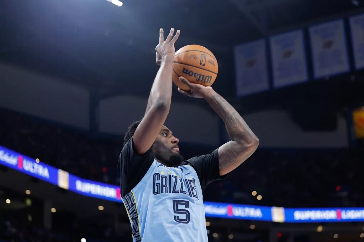 Mar 27, 2025; Oklahoma City, Oklahoma, USA; Memphis Grizzlies guard Vince Williams Jr. (5) shoots against the Oklahoma City Thunder during the second half at Paycom Center. Mandatory Credit: Alonzo Adams-Imagn Images