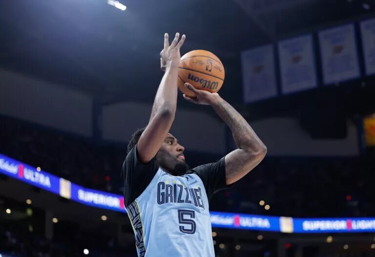 Mar 27, 2025; Oklahoma City, Oklahoma, USA; Memphis Grizzlies guard Vince Williams Jr. (5) shoots against the Oklahoma City Thunder during the second half at Paycom Center. Mandatory Credit: Alonzo Adams-Imagn Images