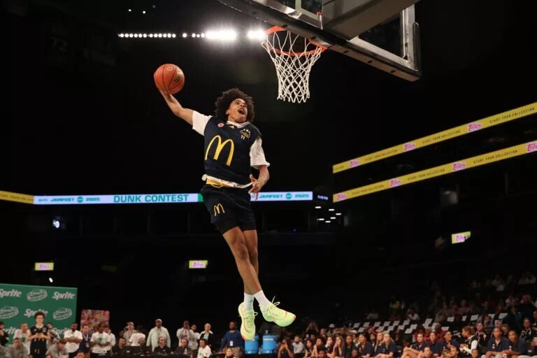 Mar 31, 2025; Brooklyn, New York, USA; McDonald’s All American West guard Mikel Brown Jr. (11) dunks the ball during the Sprite Jam Fest at Barclay's Center. Mandatory Credit: Pamela Smith-Imagn Images