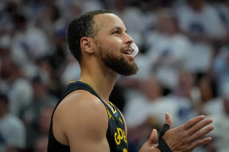 May 6, 2025; Minneapolis, Minnesota, USA; Golden State Warriors guard Stephen Curry (30) prepares to play the Minnesota Timberwolves before game one of the second round for the 2025 NBA Playoffs at Target Center. Mandatory Credit: Bruce Kluckhohn-Imagn Images