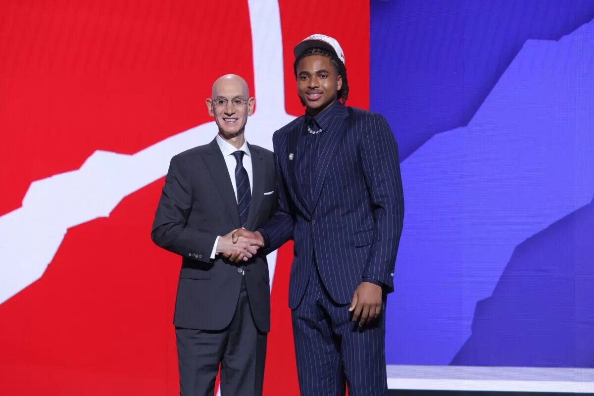 Jun 25, 2025; Brooklyn, NY, USA; Collin Murray-Boyles stands with NBA commissioner Adam Silver after being selected as the ninth pick by the Toronto Raptors in the first round of the 2025 NBA Draft at Barclays Center. Mandatory Credit: Brad Penner-Imagn Images