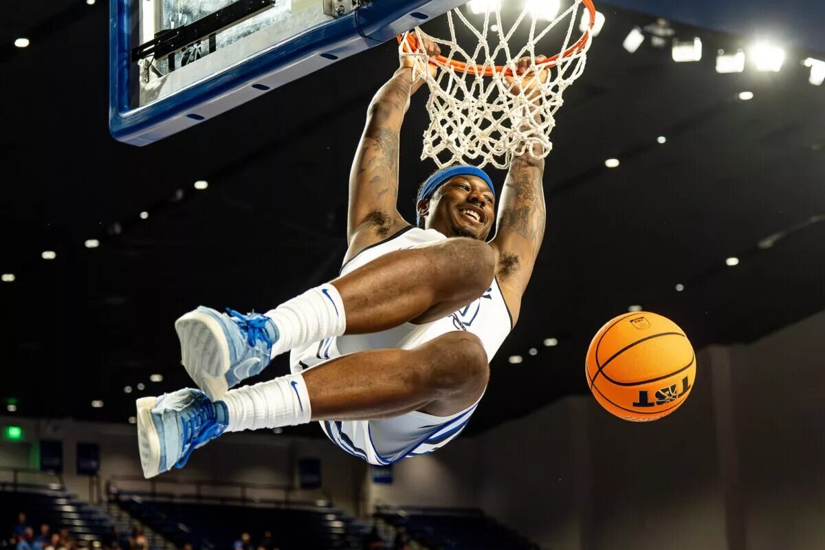 La Familia's Archie Goodwin (10) smiled at his bench while dunking the ball during the first round of The Basketball Tournament (TBT) at Memorial Coliseum in Lexington, Kentucky on Friday, July 18, 2025.
