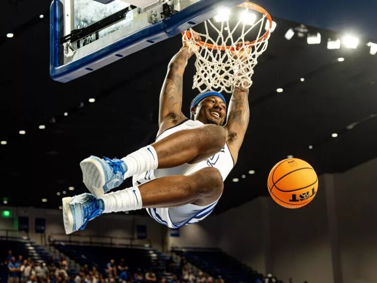 La Familia's Archie Goodwin (10) smiled at his bench while dunking the ball during the first round of The Basketball Tournament (TBT) at Memorial Coliseum in Lexington, Kentucky on Friday, July 18, 2025.