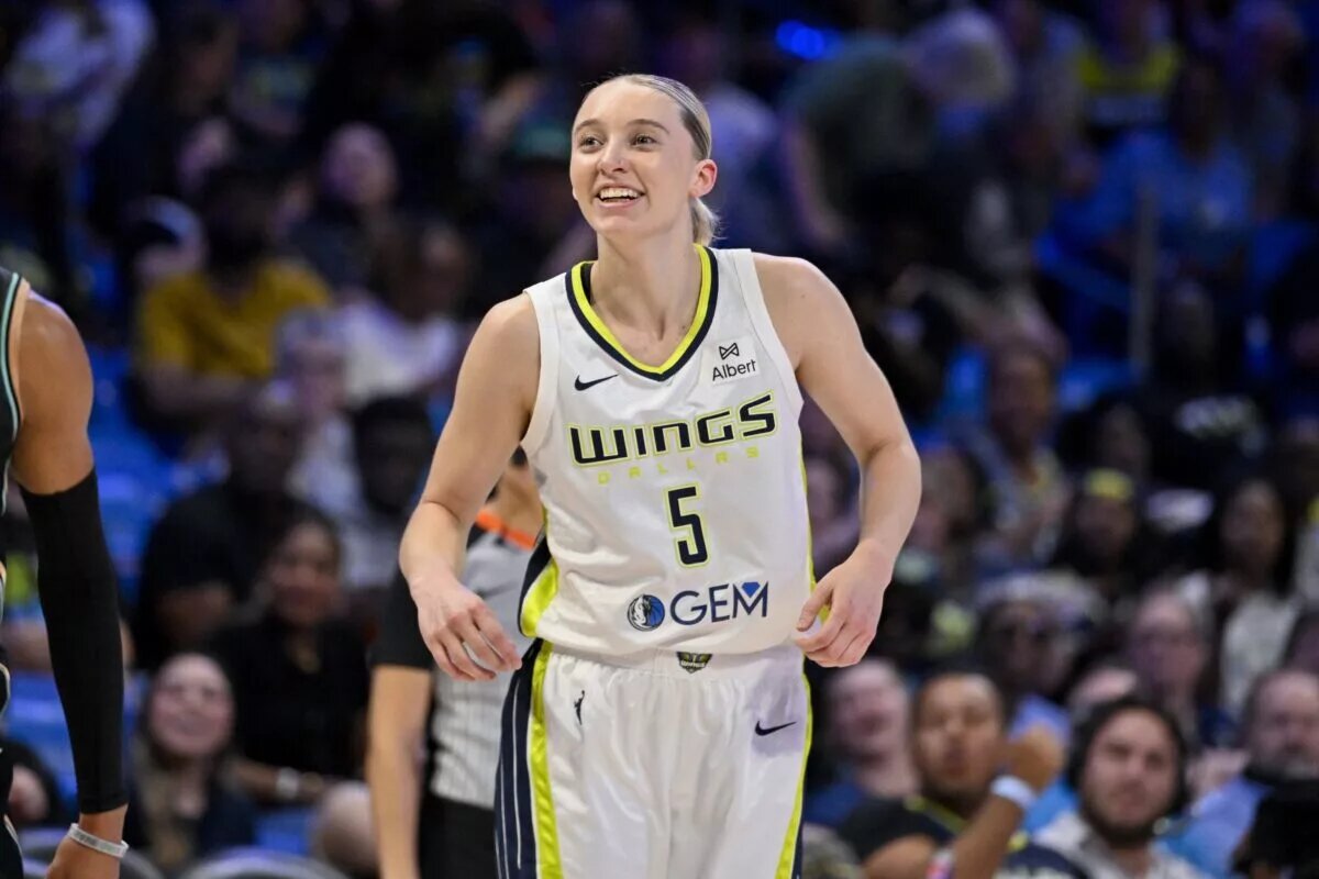 Jul 28, 2025; Arlington, Texas, USA; Dallas Wings guard Paige Bueckers (5) celebrates during the game between the Dallas Wings and the New York Liberty at College Park Center. Mandatory Credit: Jerome Miron-Imagn Images