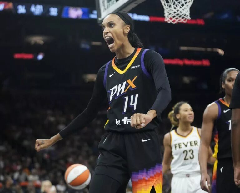 Phoenix Mercury forward DeWanna Bonner (14) celebrates after a basket against the Indiana Fever during the second quarter at PHX Arena