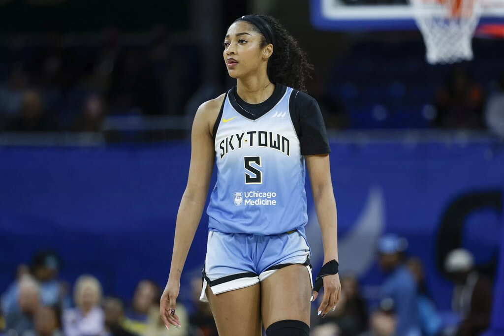 Chicago Sky forward Angel Reese (5) walks on the court during the second half of a WNBA game against the Connecticut Sun at Wintrust Arena. 