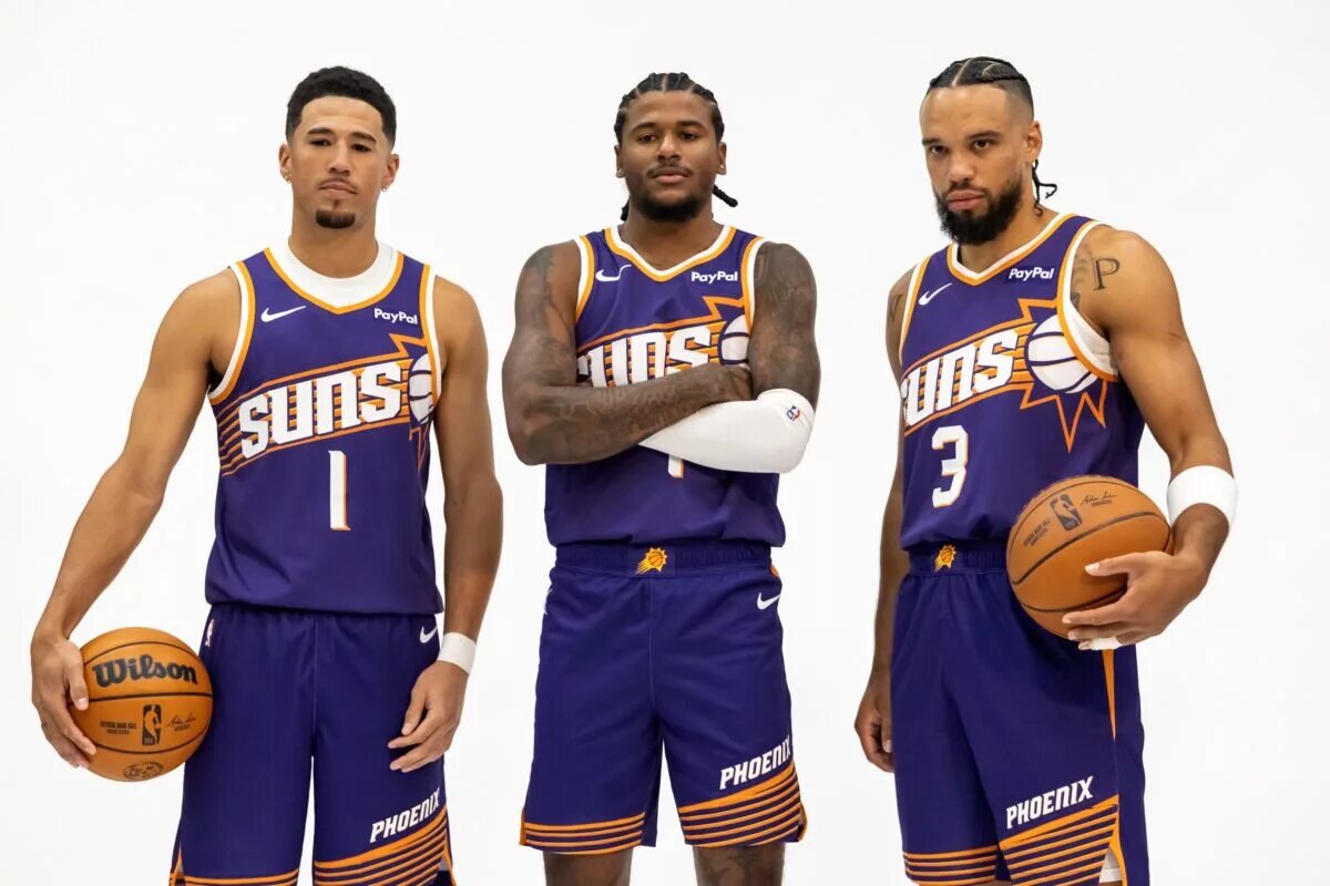 Sep 24, 2025; Phoenix, AZ, USA; Phoenix Suns guard Devin Booker (1), forward Dillon Brooks (3) and guard Jalen Green (4) pose for portrait during Media Day at PHX Arena. Mandatory Credit: Mark J. Rebilas-Imagn Images