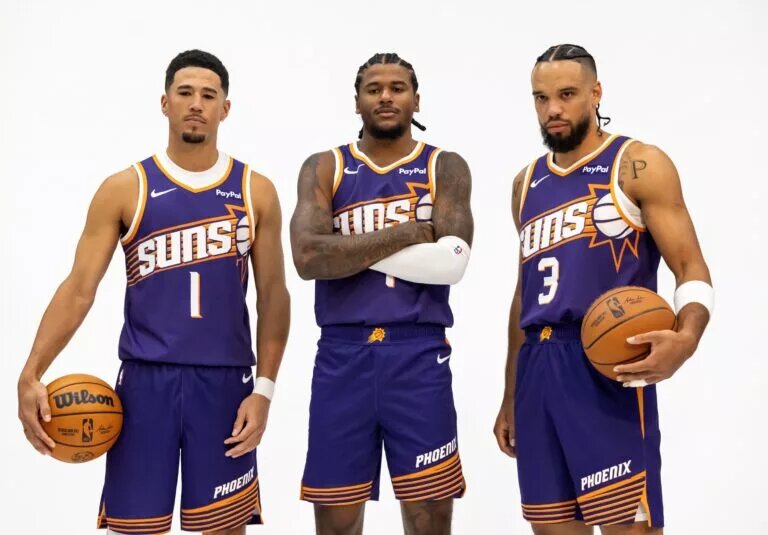 Sep 24, 2025; Phoenix, AZ, USA; Phoenix Suns guard Devin Booker (1), forward Dillon Brooks (3) and guard Jalen Green (4) pose for portrait during Media Day at PHX Arena. Mandatory Credit: Mark J. Rebilas-Imagn Images