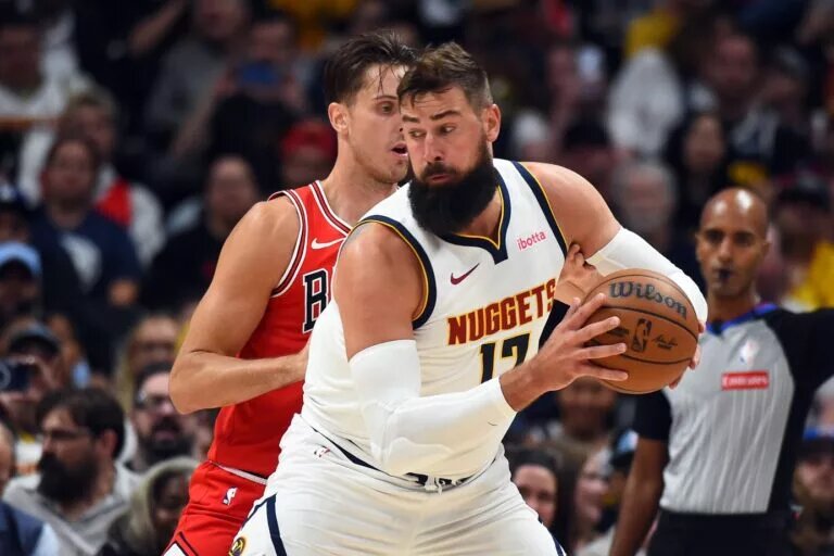 Oct 14, 2025; Denver, Colorado, USA; Denver Nuggets center Jonas Valanciunas (17) works in the post during the first half against the Chicago Bulls at Ball Arena. Mandatory Credit: Christopher Hanewinckel-Imagn Images