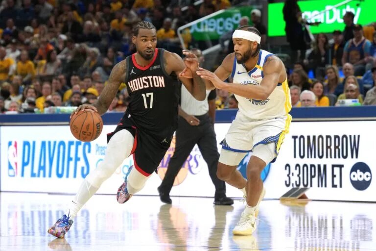 Apr 26, 2025; San Francisco, California, USA; Houston Rockets forward Tari Eason (17) dribbles against Golden State Warriors guard Moses Moody (right) during the third quarter of game three of first round for the 2024 NBA Playoffs at Chase Center. Mandatory Credit: Darren Yamashita-Imagn Images