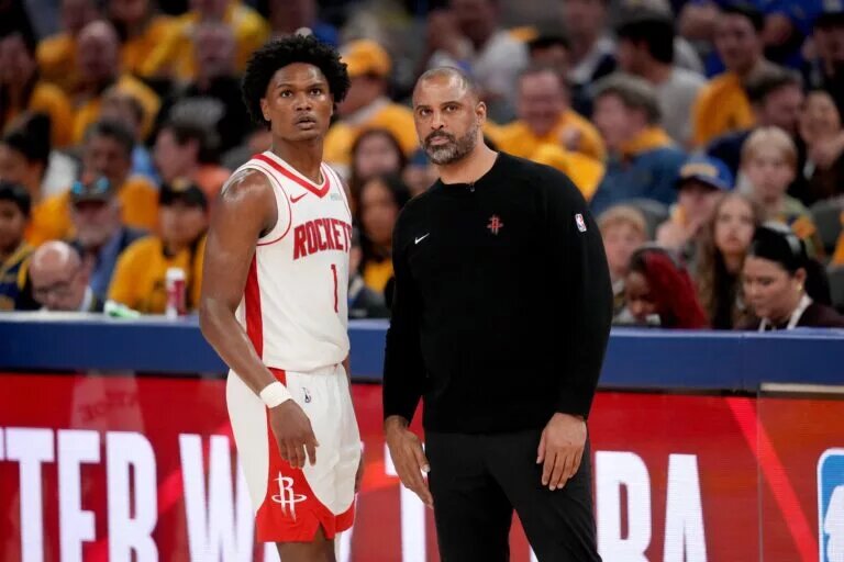 May 2, 2025; San Francisco, California, USA; Houston Rockets forward Amen Thompson (1) meets with Houston Rockets head coach Ime Udoka during a break in the action against the Golden State Warriors in the fourth quarter of game six of the first round for the 2025 NBA Playoffs at Chase Center. Mandatory Credit: Cary Edmondson-Imagn Images