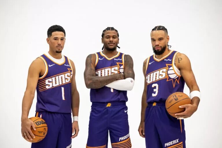 Sep 24, 2025; Phoenix, AZ, USA; Phoenix Suns guard Devin Booker (1), forward Dillon Brooks (3) and guard Jalen Green (4) pose for portrait during Media Day at PHX Arena. Mandatory Credit: Mark J. Rebilas-Imagn Images