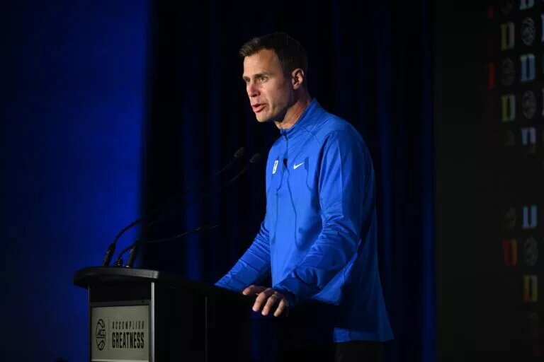 Oct 8, 2025; Charlotte, NC, USA; Duke head coach Jon Scheyer answers questions from the media at The Hilton Charlotte Uptown. Mandatory Credit: William Howard-Imagn Images