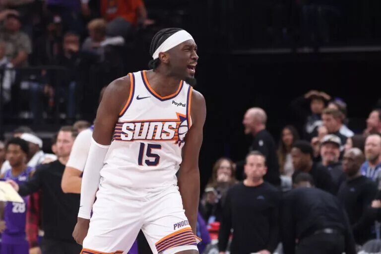 Oct 27, 2025; Salt Lake City, Utah, USA; Phoenix Suns center Mark Williams (15) reacts to tipping a ball in for a basket to tie the game against the Utah Jazz in the last seconds of the fourth quarter at Delta Center. Mandatory Credit: Rob Gray-Imagn Images