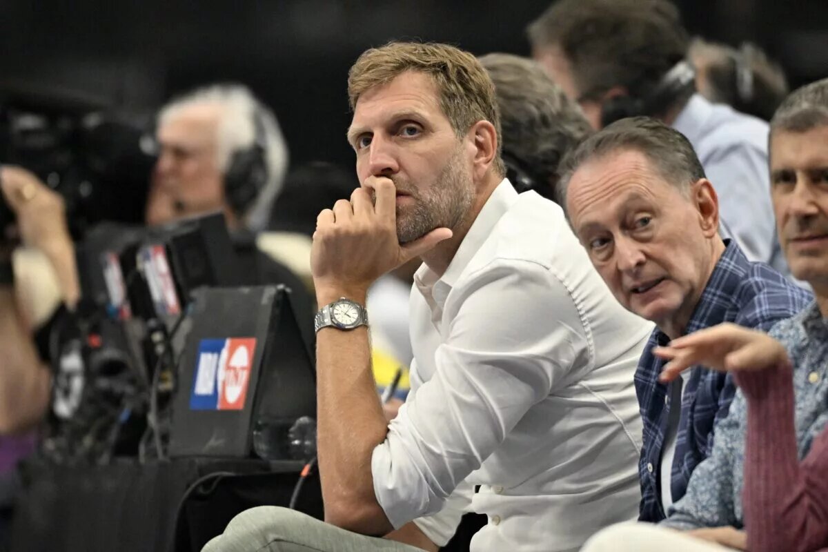 May 26, 2024; Dallas, Texas, USA; Former NBA player Dirk Nowitzki looks on in the first quarter against the Minnesota Timberwolves during game three of the western conference finals for the 2024 NBA playoffs at American Airlines Center. Mandatory Credit: Jerome Miron-USA TODAY Sports