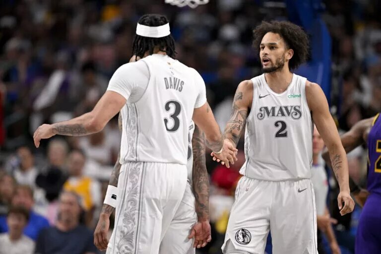 Apr 9, 2025; Dallas, Texas, USA; Dallas Mavericks forward Anthony Davis (3) and center Dereck Lively II (2) in action during the game between the Dallas Mavericks and the Los Angeles Lakers at American Airlines Center. Mandatory Credit: Jerome Miron-Imagn Images