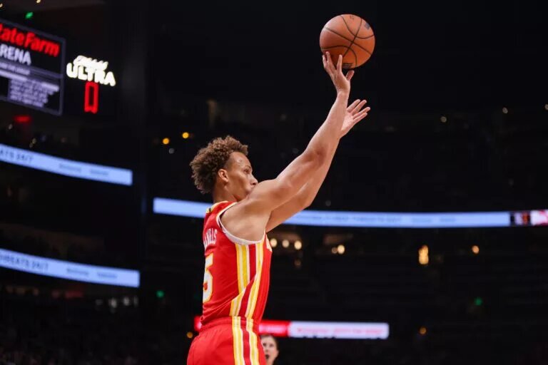 Oct 22, 2025; Atlanta, Georgia, USA; Atlanta Hawks guard Dyson Daniels (5) shoots against the Toronto Raptors in the second quarter at State Farm Arena. Mandatory Credit: Brett Davis-Imagn Images