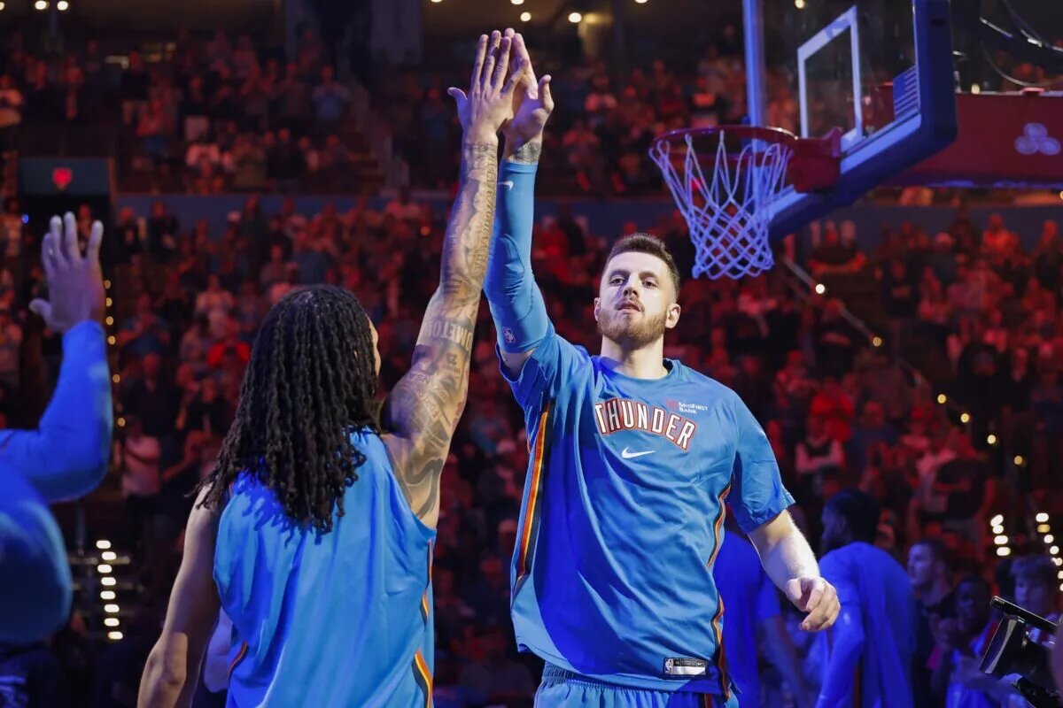 Oklahoma City Thunder center Isaiah Hartenstein (55) during introductions before a game against the Washington Wizards at Paycom Center.