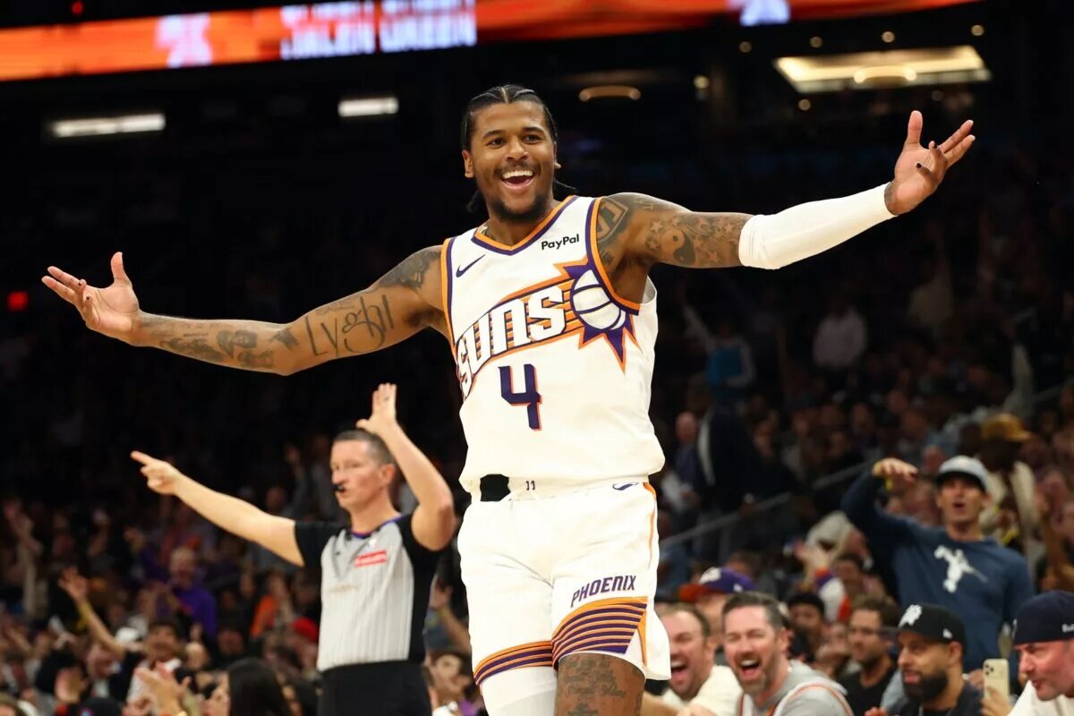 Nov 6, 2025; Phoenix, Arizona, USA; Phoenix Suns guard Jalen Green (4) celebrates a three point shot against the Los Angeles Clippers in the second half at the Mortgage Matchup Center. Mandatory Credit: Mark J. Rebilas-Imagn Images