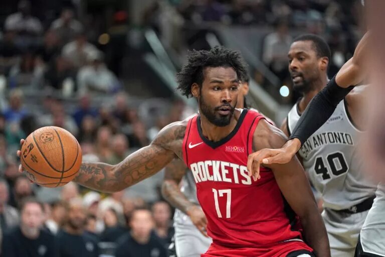 Nov 7, 2025; San Antonio, Texas, USA; Houston Rockets forward Tari Eason (17) dribbles against San Antonio Spurs forward Harrison Barnes (40) during the second quarter at Frost Bank Center. Mandatory Credit: Dustin Safranek-Imagn Images