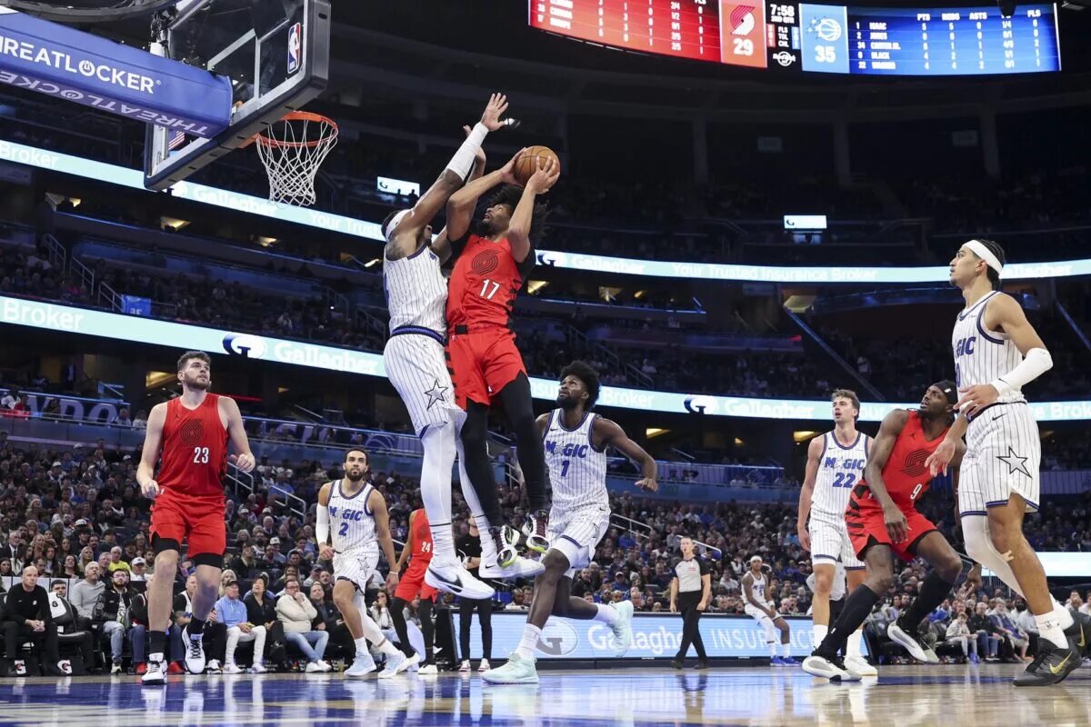 Nov 10, 2025; Orlando, Florida, USA; Portland Trail Blazers guard Shaedon Sharpe (17) drives to the basket against the Orlando Magic in the second quarter at Kia Center. Mandatory Credit: Nathan Ray Seebeck-Imagn Images