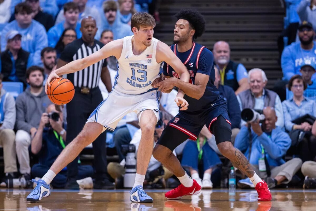 North Carolina Tar Heels center Henri Veesaar (13) backs down on Radford Highlanders forward Tyson Brown (21) during the first half at Dean E. Smith Center.