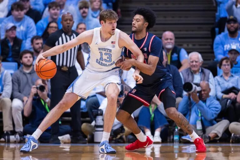 North Carolina Tar Heels center Henri Veesaar (13) backs down on Radford Highlanders forward Tyson Brown (21) during the first half at Dean E. Smith Center.