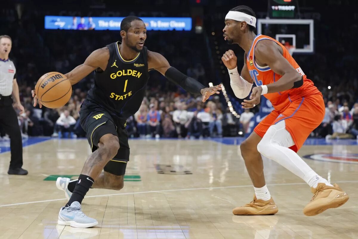 Nov 11, 2025; Oklahoma City, Oklahoma, USA; Golden State Warriors forward Jonathan Kuminga (1) moves the ball down the court beside Oklahoma City Thunder guard Shai Gilgeous-Alexander (2) during the second half at Paycom Center. Mandatory Credit: Alonzo Adams-Imagn Images