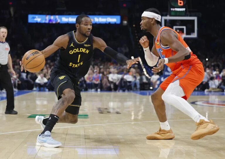 Nov 11, 2025; Oklahoma City, Oklahoma, USA; Golden State Warriors forward Jonathan Kuminga (1) moves the ball down the court beside Oklahoma City Thunder guard Shai Gilgeous-Alexander (2) during the second half at Paycom Center. Mandatory Credit: Alonzo Adams-Imagn Images