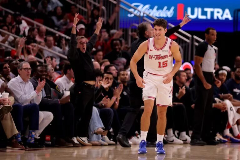 Nov 12, 2025; Houston, Texas, USA; Houston Rockets guard Reed Sheppard (15) reacts after a made basket against the Washington Wizards during the third quarter at Toyota Center. Mandatory Credit: Erik Williams-Imagn Images