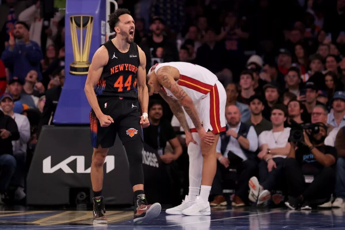 Nov 14, 2025; New York, New York, USA; New York Knicks guard Landry Shamet (44) reacts in front of Miami Heat center Kel'el Ware (7) during the fourth quarter at Madison Square Garden. Mandatory Credit: Brad Penner-Imagn Images