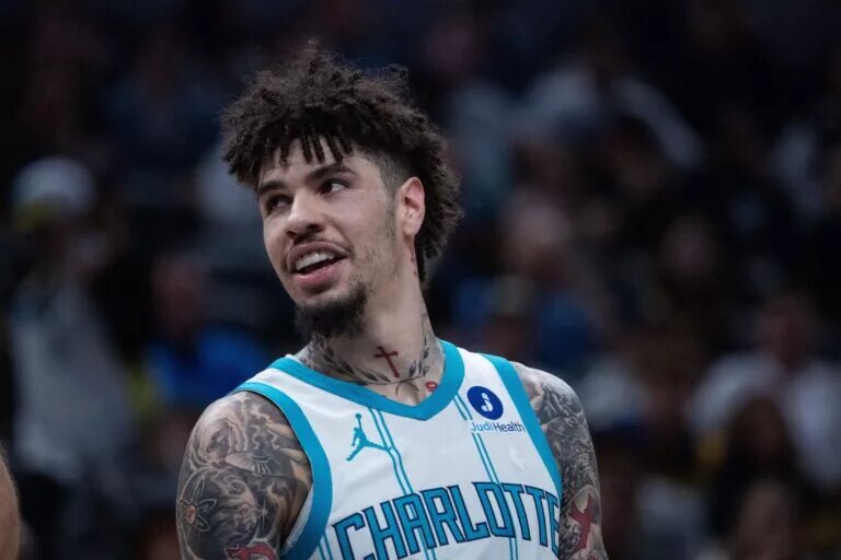 Charlotte Hornets guard LaMelo Ball (1) looks on in the first half against the Indiana Pacers at Gainbridge Fieldhouse.