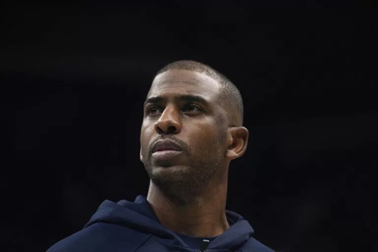 Nov 22, 2025; Charlotte, North Carolina, USA; Los Angeles Clippers guard Chris Paul (3) in a time out during the first half against the Charlotte Hornets at the Spectrum Center. Mandatory Credit: Sam Sharpe-Imagn Images