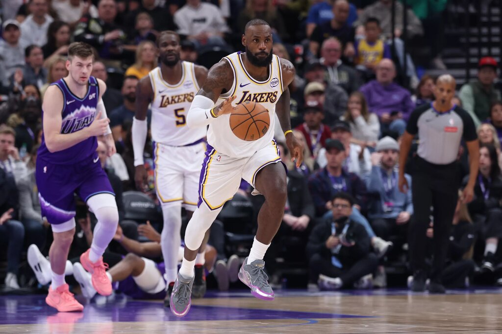 Nov 23, 2025; Salt Lake City, Utah, USA; Los Angeles Lakers forward LeBron James (23) brings the ball up the court against the Utah Jazz during the first half at Delta Center. Mandatory Credit: Rob Gray-Imagn Images