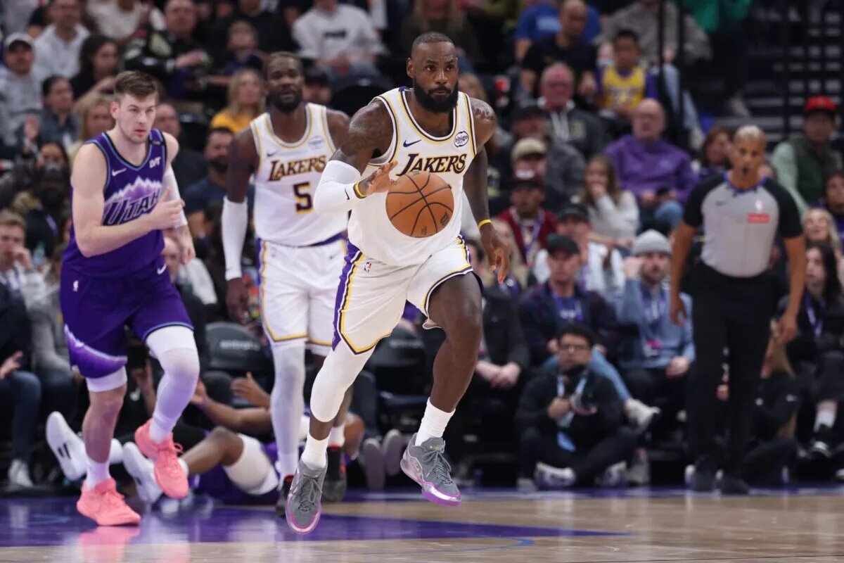 Nov 23, 2025; Salt Lake City, Utah, USA; Los Angeles Lakers forward LeBron James (23) brings the ball up the court against the Utah Jazz during the first half at Delta Center. Mandatory Credit: Rob Gray-Imagn Images