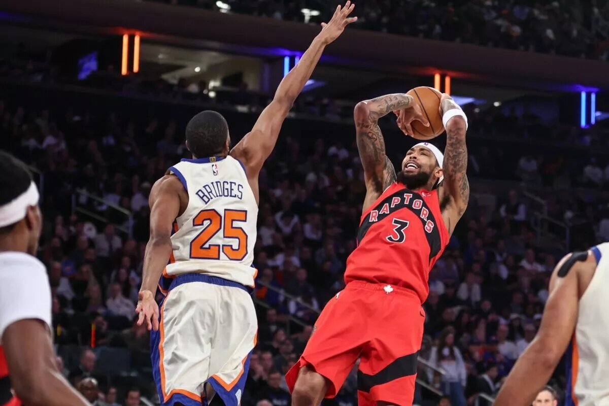 Toronto Raptors forward Brandon Ingram (3) shoots past New York Knicks guard Mikal Bridges (25) in the first quarter at Madison Square Garden.