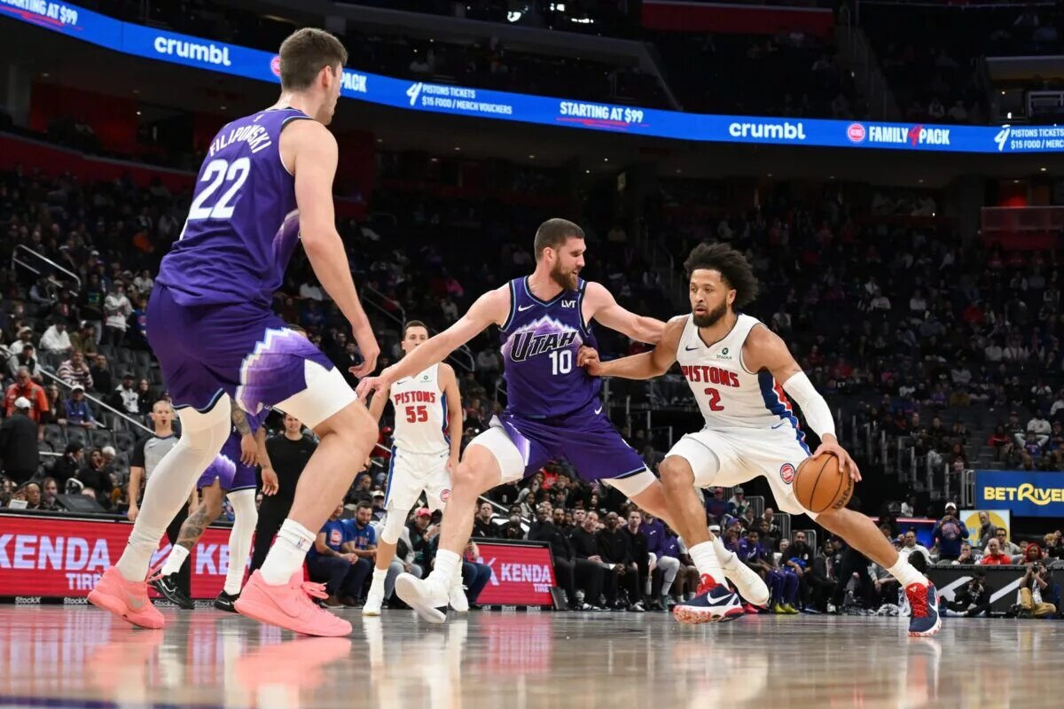 Nov 5, 2025; Detroit, Michigan, USA; Detroit Pistons guard Cade Cunningham (2) drives the lane against Utah Jazz guard Svi Mykhailiuk (10) in the fourth quarter at Little Caesars Arena. Mandatory Credit: Lon Horwedel-Imagn Images