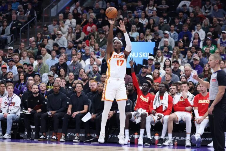 Nov 13, 2025; Salt Lake City, Utah, USA; Atlanta Hawks forward Onyeka Okongwu (17) makes a three point basket against the Utah Jazz during the second quarter at Delta Center. Mandatory Credit: Rob Gray-Imagn Images