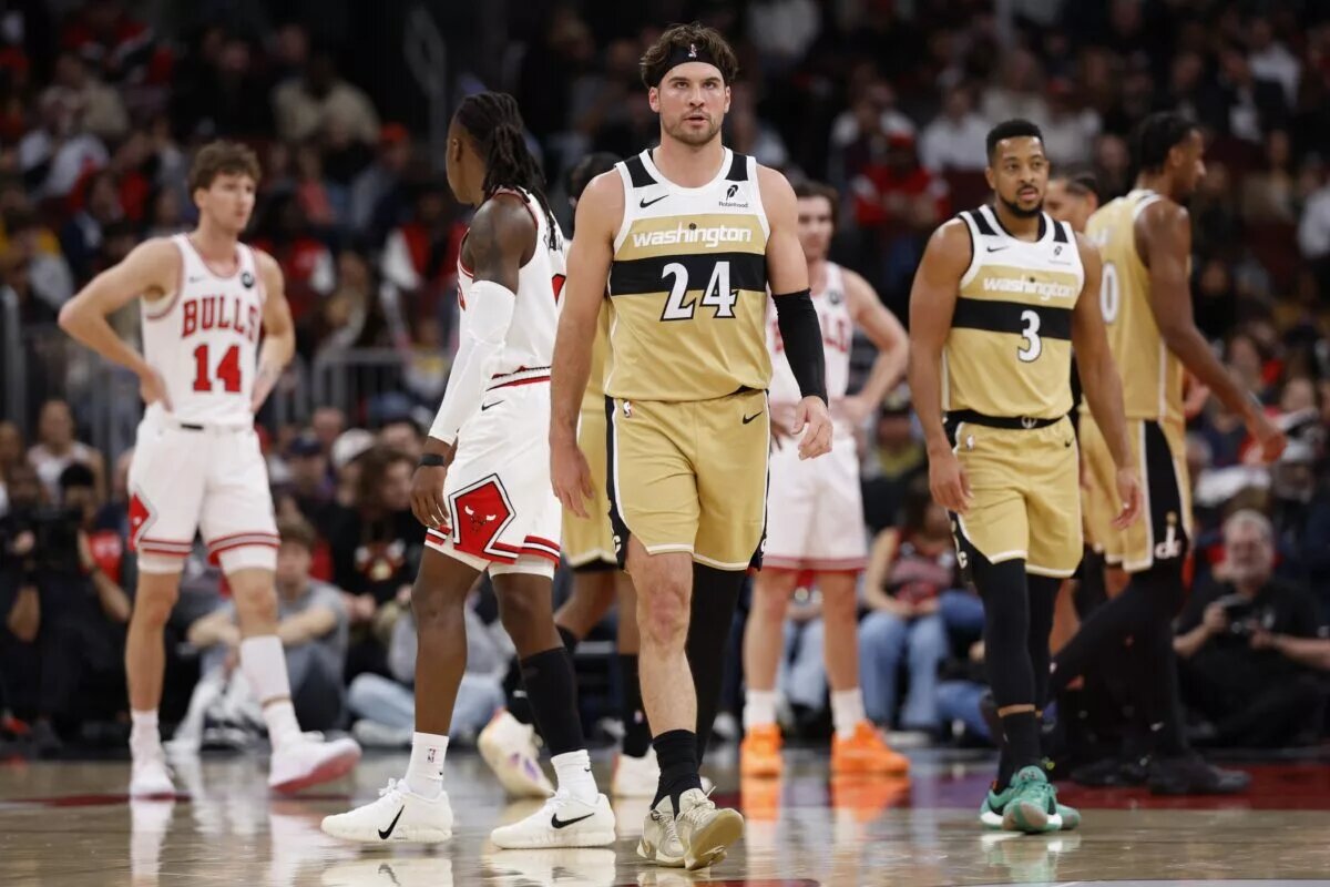 Washington Wizards forward Corey Kispert (24) reacts after scoring against the Chicago Bulls during the first half at United Center.