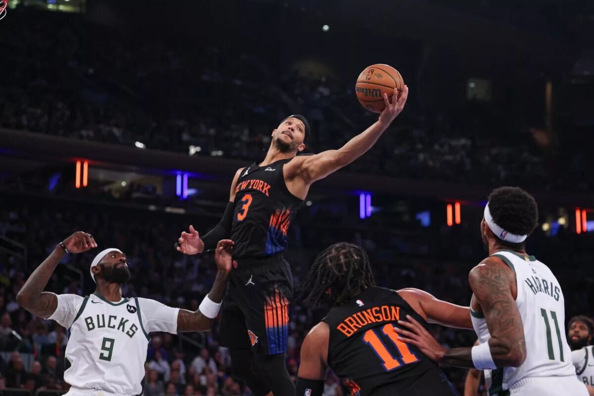 Nov 28, 2025; New York, New York, USA; New York Knicks guard Josh Hart (3) rebounds during the first half against Milwaukee Bucks forward Bobby Portis (9) at Madison Square Garden. Mandatory Credit: Vincent Carchietta-Imagn Images