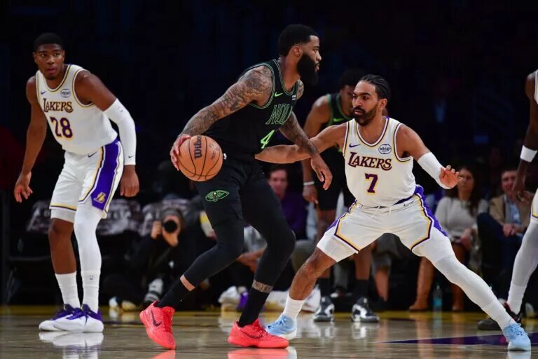 Nov 30, 2025; Los Angeles, California, USA; New Orleans Pelicans guard Saddiq Bey (41) moves the ball against Los Angeles Lakers guard Gabe Vincent (7) during the first half at Crypto.com Arena. Mandatory Credit: Gary A. Vasquez-Imagn Images