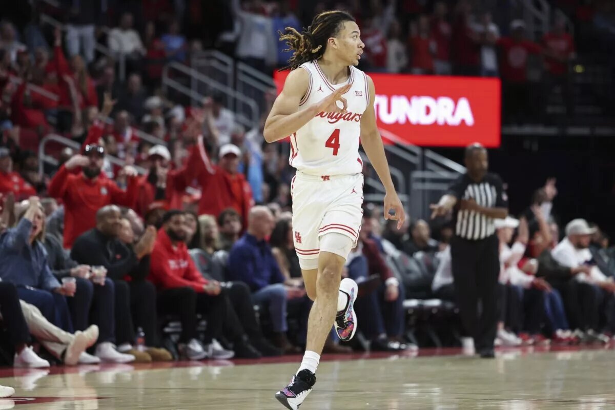 Houston Cougars guard Kingston Flemings (4) reacts after making a basket during the second half against the Florida State Seminoles at Toyota Center.