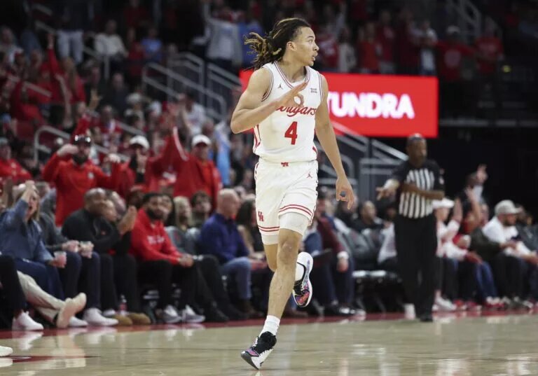 Houston Cougars guard Kingston Flemings (4) reacts after making a basket during the second half against the Florida State Seminoles at Toyota Center.